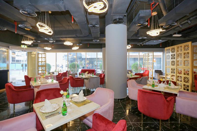 Ivory Grand Hotel Apartments - Restoran