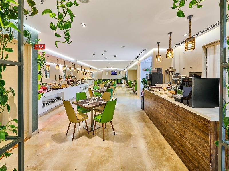 Ramada Hotel & Suites by Wyndham JBR - Restoran