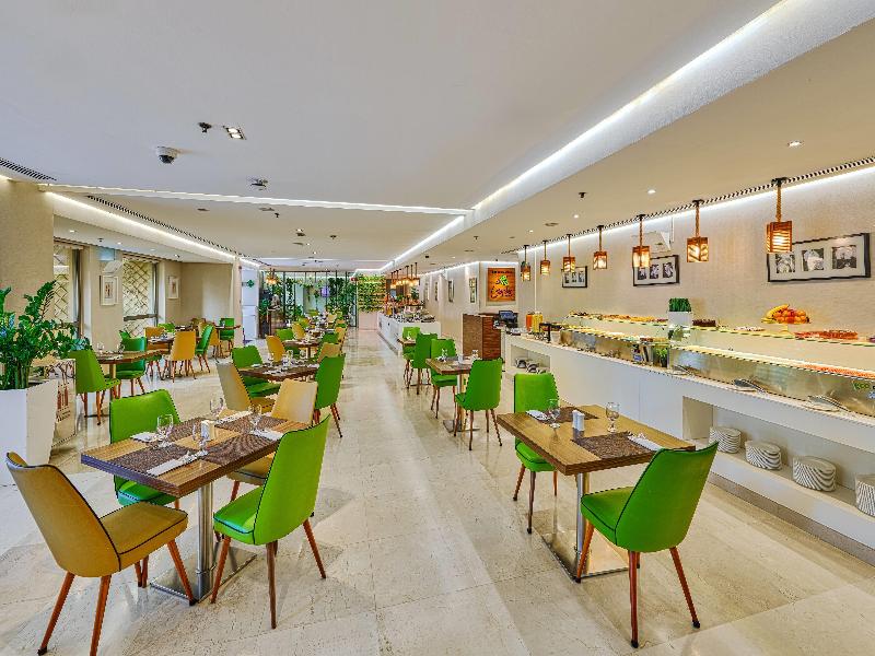 Ramada Hotel & Suites by Wyndham JBR - Restoran