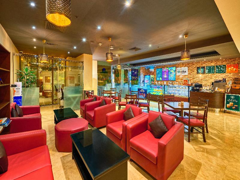 Ramada Hotel & Suites by Wyndham JBR - Restoran