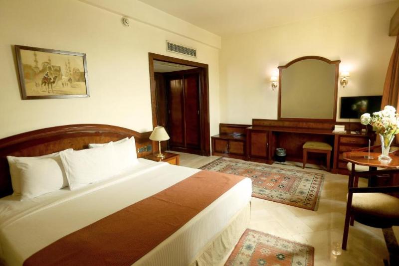 Triumph Plaza Hotel - Oda