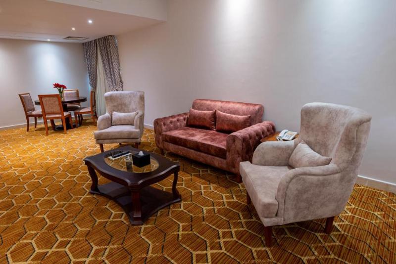 Triumph Plaza Hotel - Oda