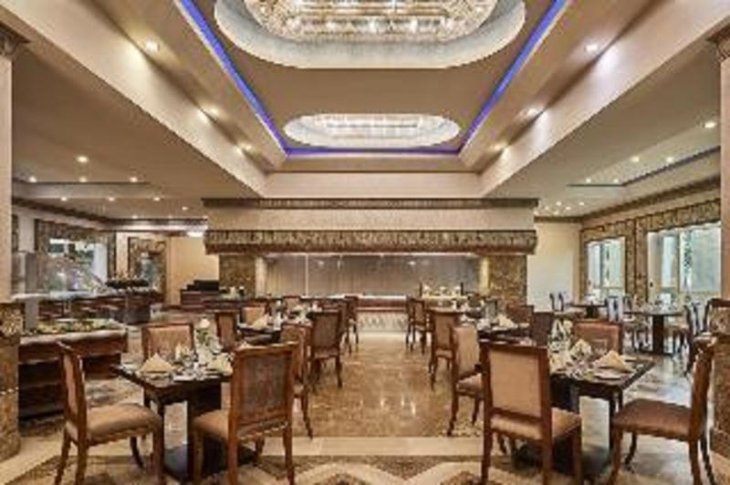 Triumph Plaza Hotel - Restoran