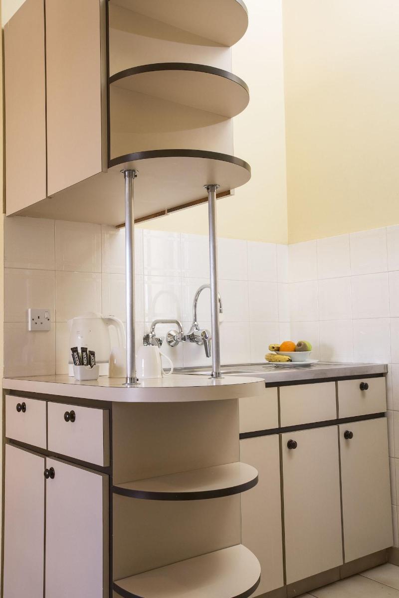 Pigeon Beach Hotel Apartments - Oda