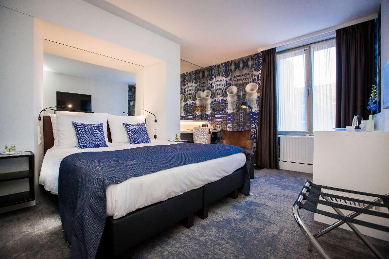 Golden Tulip Hotel Central - Oda
