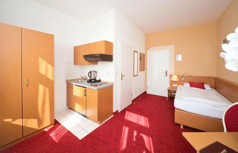 City Hotel Am Wasserturm - Oda