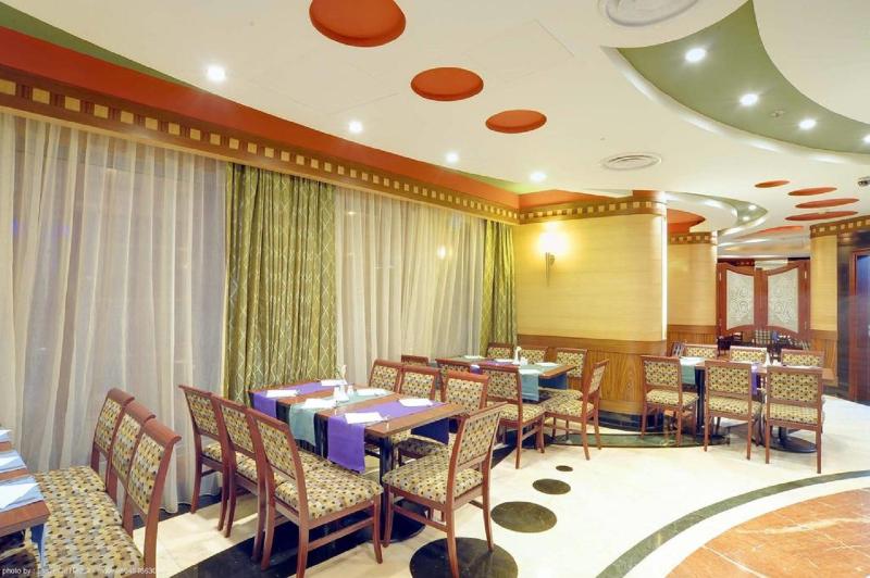 Leader Al Muna Kareem Hotel - Restoran