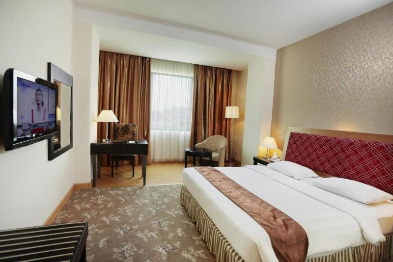 Rocky Plaza Hotel Padang - Oda