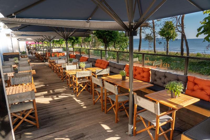 Nymphe Strandhotel & Apartments - Teras
